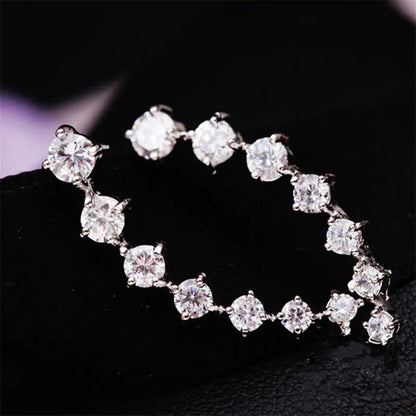 Gold and Silver Diamond Stud and Drop Earrings.